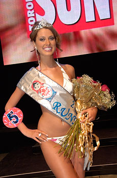 Miss Matryoshka 2006 2nd Runner-up Inga Skaya with logo of the Toronto Sun in the background