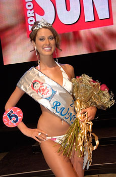 Miss Matryoshka 2006 2nd Runner-up Inga Skaya with logo of the Toronto Sun in the background
